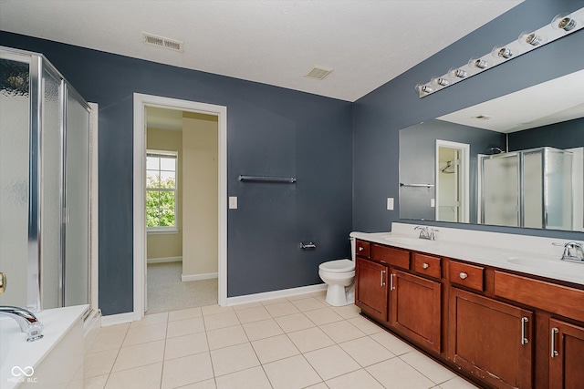 13722 Wendessa Dr, Fishers, IN 46038 - bathroom with a shower stall, double vanity, tile patterned floors, and a tub