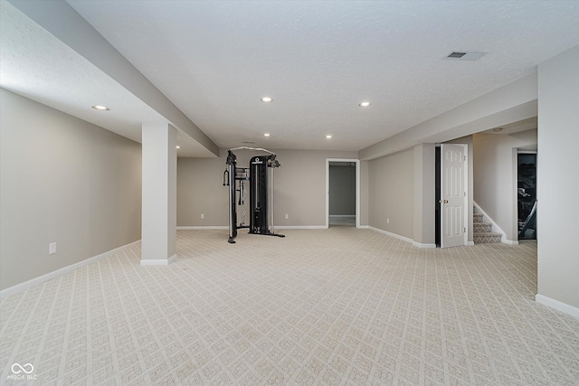 13722 Wendessa Dr, Fishers, IN 46038 - finished below grade area featuring stairs, light colored carpet, and recessed lighting