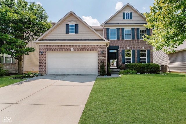 13722 Wendessa Dr, Fishers, IN 46038 - view of front of property featuring brick siding, a front yard, and concrete driveway