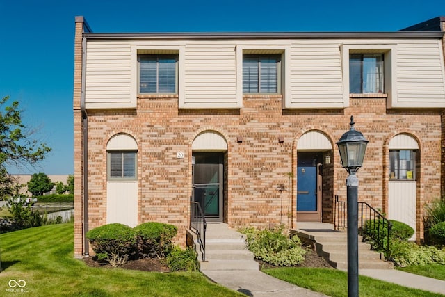 20 Druid Hill Ct, Carmel, IN 46032 - multi unit property featuring brick siding and a front lawn