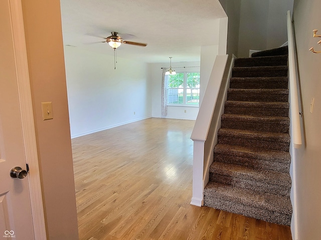 1047 S Jefferson St, Brownsburg, IN 46112 - stairway featuring wood finished floors and a ceiling fan