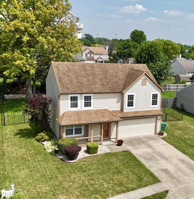 1047 S Jefferson St, Brownsburg, IN 46112 - traditional-style home with covered porch, a garage, driveway, and a shingled roof