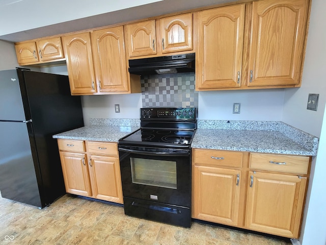 1047 S Jefferson St, Brownsburg, IN 46112 - kitchen with black appliances, exhaust hood, light stone counters, and light brown cabinetry