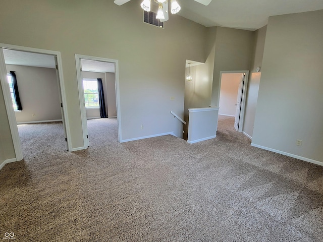 1047 S Jefferson St, Brownsburg, IN 46112 - carpeted empty room featuring high vaulted ceiling and a ceiling fan