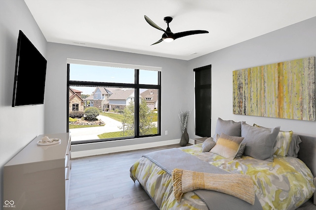 13417 Cambridge Cove Way, Fishers, IN 46055 - bedroom with wood finished floors and ceiling fan
