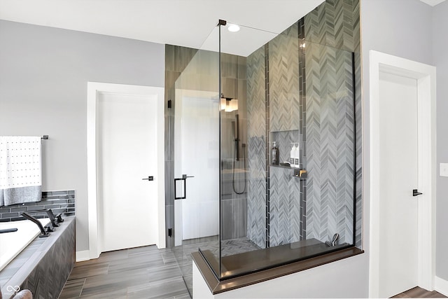 13417 Cambridge Cove Way, Fishers, IN 46055 - bathroom featuring a shower stall and a garden tub