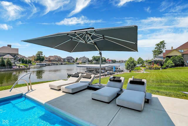 13417 Cambridge Cove Way, Fishers, IN 46055 - swimming pool featuring a patio area, a yard, a residential view, and a water view