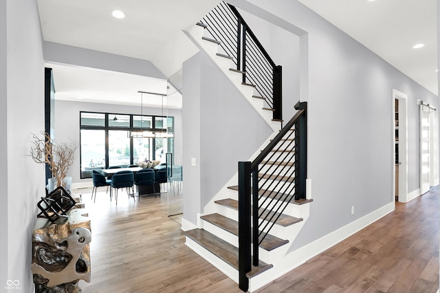 13417 Cambridge Cove Way, Fishers, IN 46055 - stairway featuring wood finished floors and recessed lighting