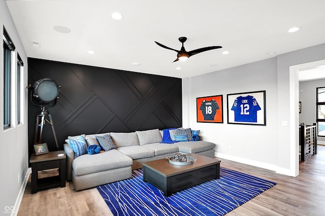 13417 Cambridge Cove Way, Fishers, IN 46055 - living room with a decorative wall, wood finished floors, a ceiling fan, and recessed lighting