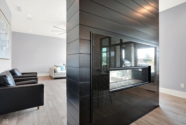 13417 Cambridge Cove Way, Fishers, IN 46055 - bar featuring light wood-type flooring and baseboards