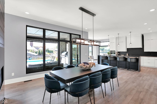 13417 Cambridge Cove Way, Fishers, IN 46055 - dining space with light wood finished floors and recessed lighting