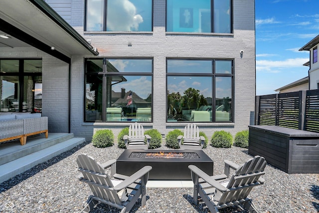 13417 Cambridge Cove Way, Fishers, IN 46055 - view of patio / terrace with an outdoor fire pit and a jacuzzi