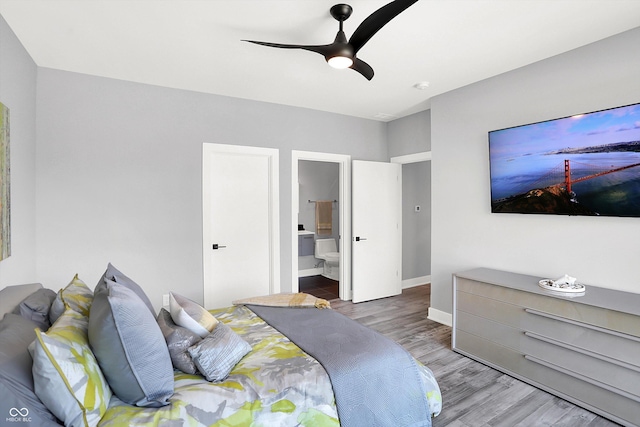 13417 Cambridge Cove Way, Fishers, IN 46055 - bedroom with wood finished floors, ceiling fan, and ensuite bathroom