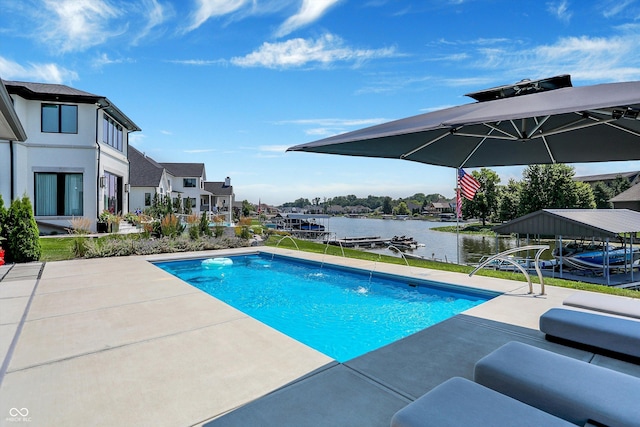 13417 Cambridge Cove Way, Fishers, IN 46055 - outdoor pool featuring a water view, a patio area, a boat dock, and boat lift