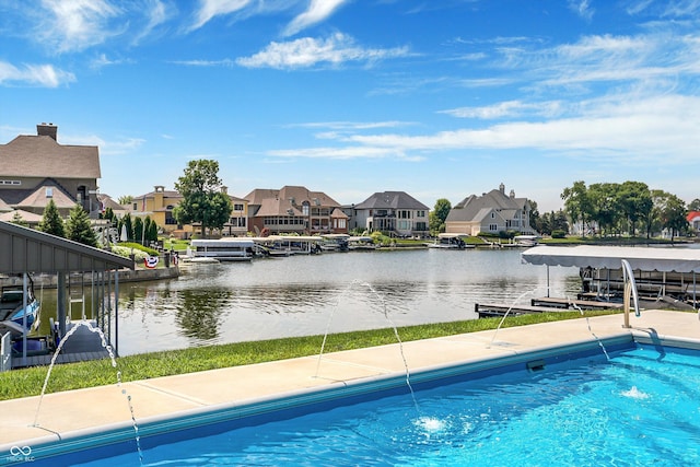 13417 Cambridge Cove Way, Fishers, IN 46055 - outdoor pool with a residential view, a water view, and a dock