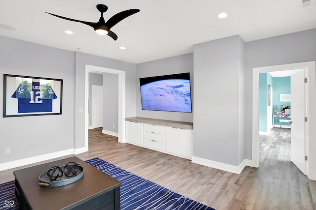 13417 Cambridge Cove Way, Fishers, IN 46055 - living area featuring wood finished floors, a ceiling fan, and recessed lighting