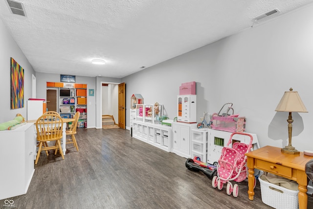 11534 Capistrano Cir, Indianapolis, IN 46236 - recreation room with wood finished floors and a textured ceiling