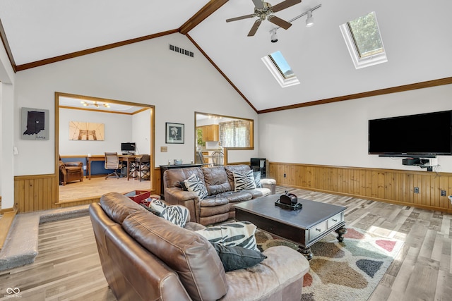 11534 Capistrano Cir, Indianapolis, IN 46236 - living area with wood finished floors, a wainscoted wall, an office area, wood walls, and ceiling fan