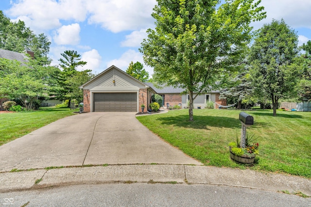 11534 Capistrano Cir, Indianapolis, IN 46236 - mid-century inspired home with a front yard, concrete driveway, a garage, and brick siding