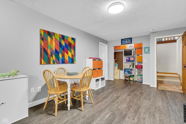 11534 Capistrano Cir, Indianapolis, IN 46236 - dining space featuring a textured ceiling and wood finished floors