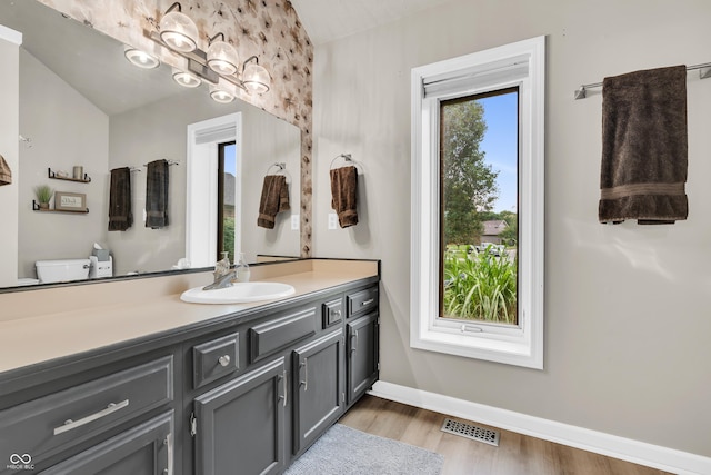 11534 Capistrano Cir, Indianapolis, IN 46236 - bathroom with vanity and wood finished floors