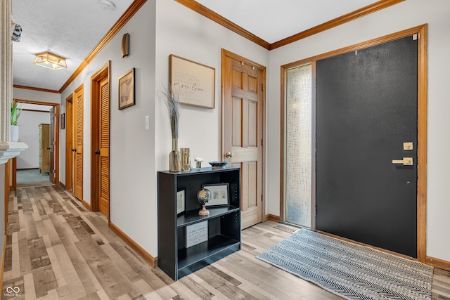 11534 Capistrano Cir, Indianapolis, IN 46236 - foyer featuring light wood-type flooring and ornamental molding