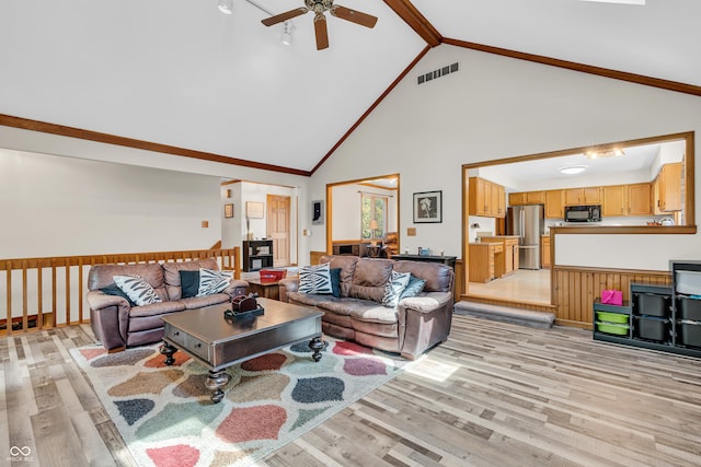 11534 Capistrano Cir, Indianapolis, IN 46236 - living area featuring light wood-style flooring, a ceiling fan, high vaulted ceiling, and beamed ceiling