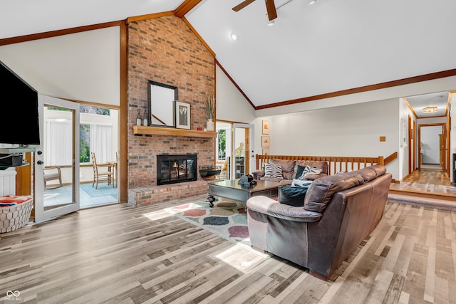 11534 Capistrano Cir, Indianapolis, IN 46236 - living room with a brick fireplace, high vaulted ceiling, ceiling fan, wood finished floors, and beam ceiling