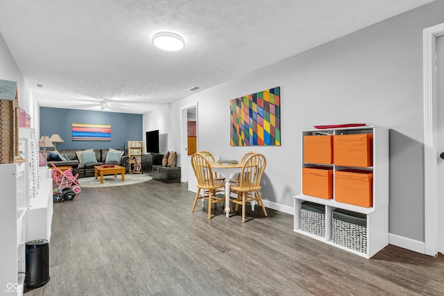11534 Capistrano Cir, Indianapolis, IN 46236 - dining room featuring a textured ceiling and wood finished floors