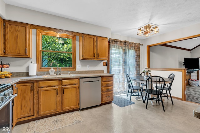 11534 Capistrano Cir, Indianapolis, IN 46236 - kitchen with dishwasher, range, brown cabinets, light countertops, and a textured ceiling