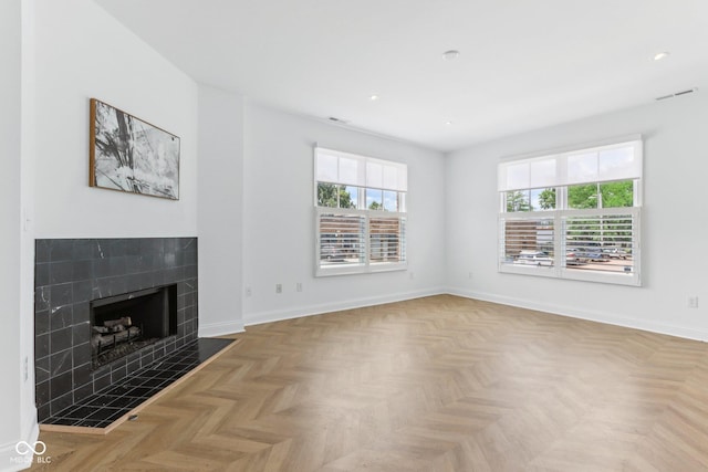 1003 Alabama St, Indianapolis, IN 46202 - unfurnished living room with a tile fireplace and recessed lighting