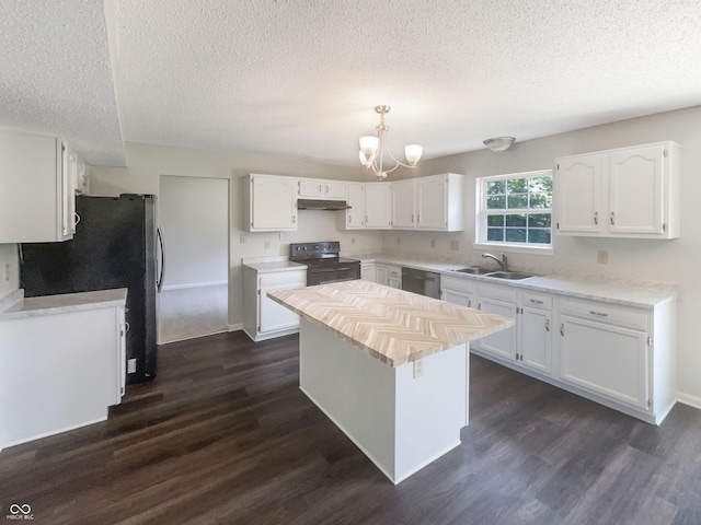 81 Brookland Ln, Pittsboro, IN 46167 - kitchen with black range with electric cooktop, stainless steel dishwasher, a textured ceiling, light countertops, and white cabinets