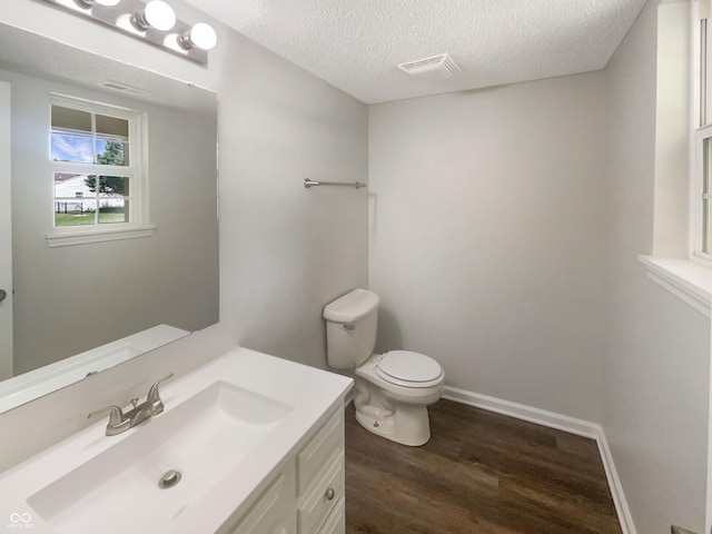 81 Brookland Ln, Pittsboro, IN 46167 - half bath with vanity, wood finished floors, and a textured ceiling