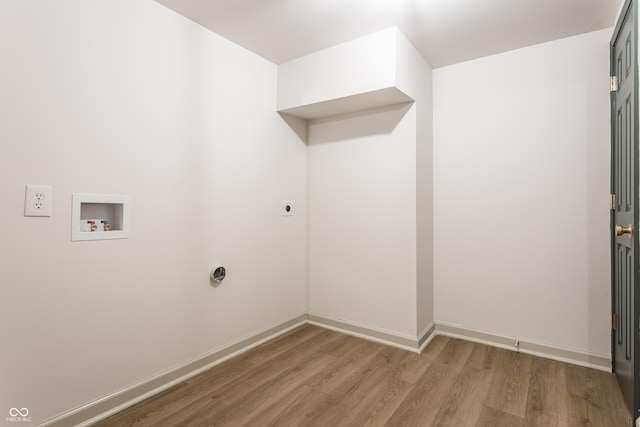 316 Ohmer Ave, Indianapolis, IN 46219 - washroom with electric dryer hookup, light wood-type flooring, and washer hookup