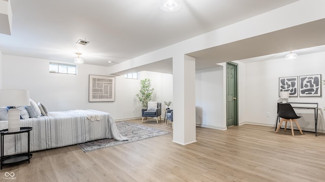 316 Ohmer Ave, Indianapolis, IN 46219 - bedroom featuring light wood-style flooring