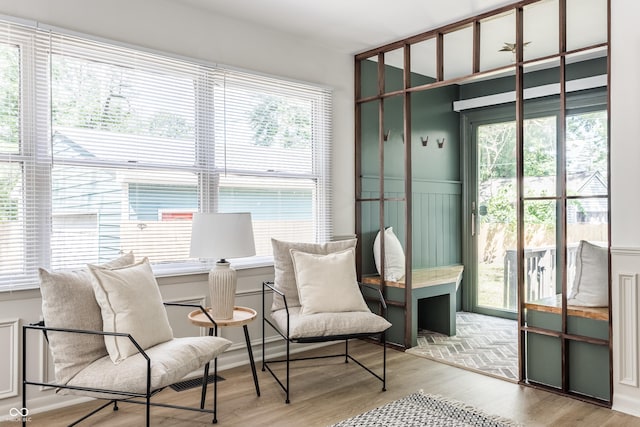 316 Ohmer Ave, Indianapolis, IN 46219 - sitting room with healthy amount of natural light and wood finished floors