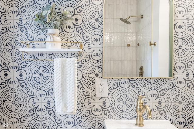 316 Ohmer Ave, Indianapolis, IN 46219 - bathroom featuring tiled shower and a sink