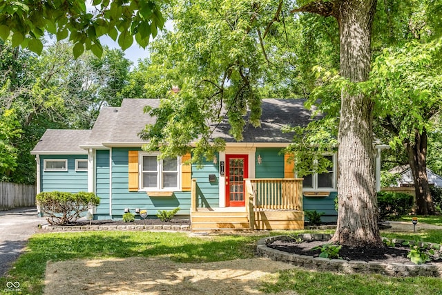 316 Ohmer Ave, Indianapolis, IN 46219 - view of front facade featuring roof with shingles