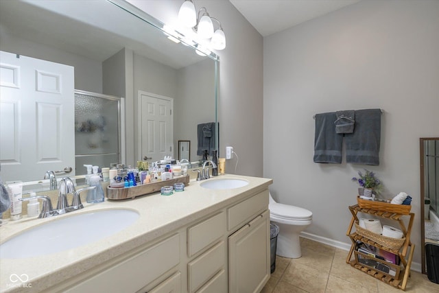 4285 Washington Blvd, Plainfield, IN 46168 - bathroom featuring a shower stall, double vanity, and tile patterned floors