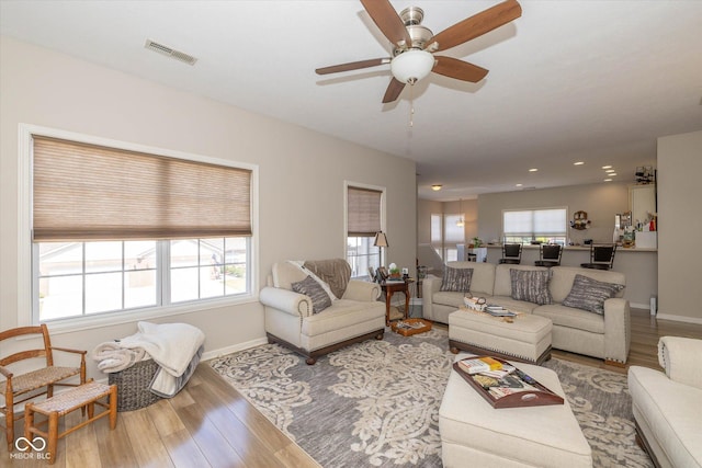 4285 Washington Blvd, Plainfield, IN 46168 - living room featuring wood finished floors, a ceiling fan, and recessed lighting