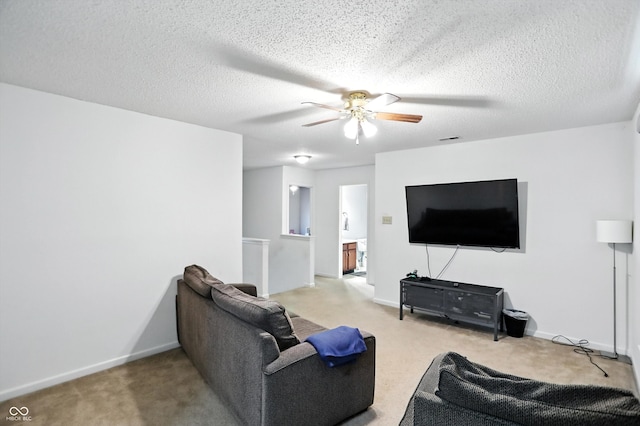2421 Amberleigh Dr, Plainfield, IN 46168 - carpeted living room featuring ceiling fan and a textured ceiling