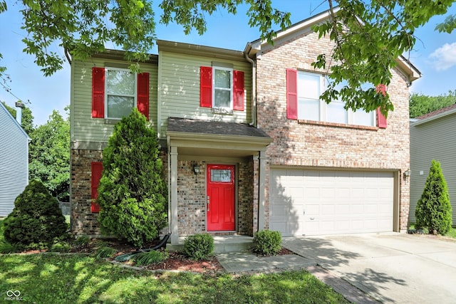 2421 Amberleigh Dr, Plainfield, IN 46168 - traditional-style house with a garage, brick siding, and concrete driveway