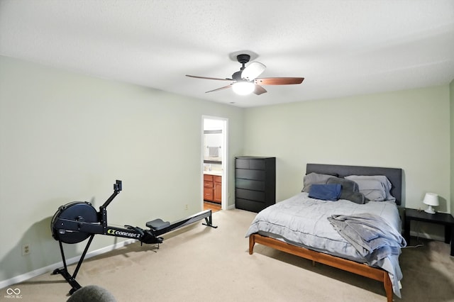 2421 Amberleigh Dr, Plainfield, IN 46168 - bedroom with light carpet, a ceiling fan, and ensuite bath