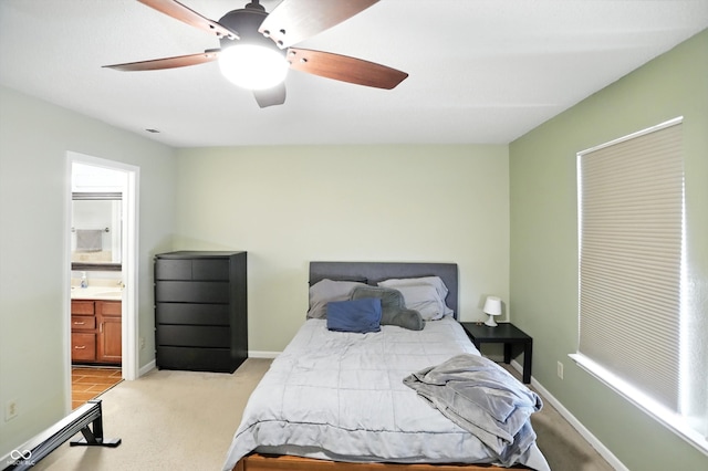 2421 Amberleigh Dr, Plainfield, IN 46168 - bedroom featuring light colored carpet, a ceiling fan, and ensuite bath