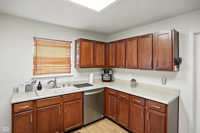 2421 Amberleigh Dr, Plainfield, IN 46168 - kitchen featuring dishwasher, light countertops, and light wood-style flooring