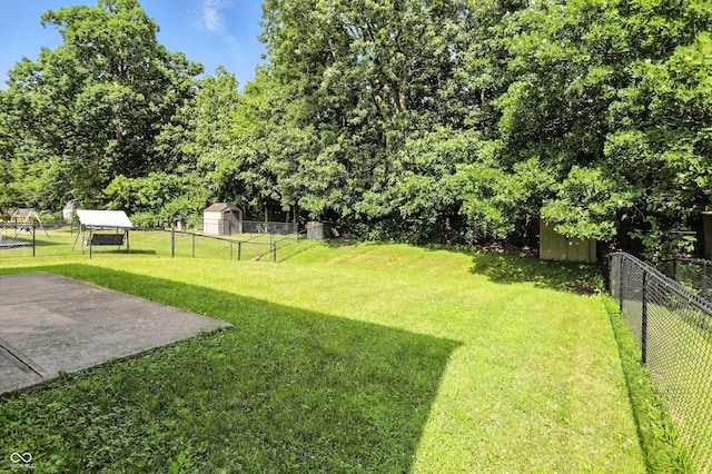 2421 Amberleigh Dr, Plainfield, IN 46168 - fenced backyard with a storage unit