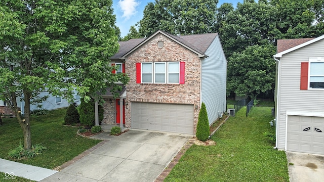 2421 Amberleigh Dr, Plainfield, IN 46168 - traditional home featuring concrete driveway, a front lawn, a garage, brick siding, and roof with shingles