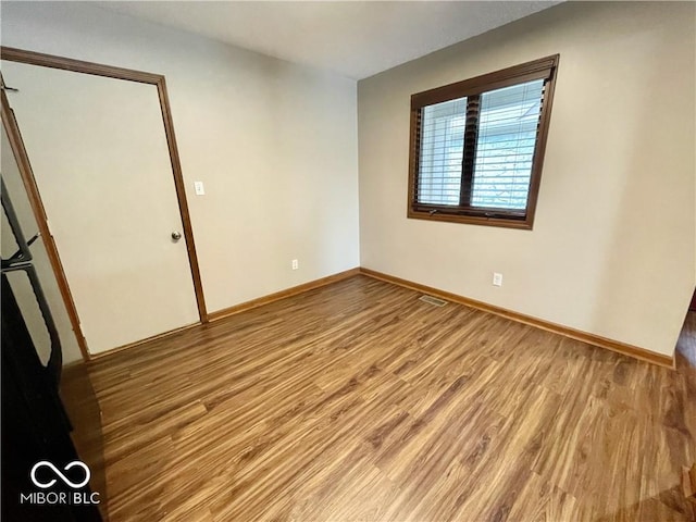 35 Northridge Ct, Brownsburg, IN 46112 - unfurnished bedroom featuring wood finished floors and baseboards