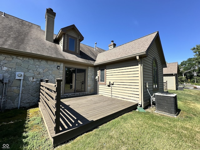 35 Northridge Ct, Brownsburg, IN 46112 - back of house featuring stone siding, a chimney, a deck, and a yard