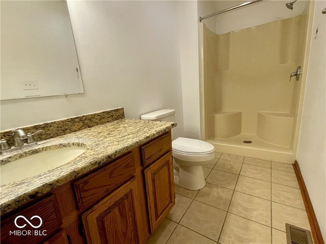 35 Northridge Ct, Brownsburg, IN 46112 - bathroom featuring a walk in shower, vanity, and tile patterned flooring